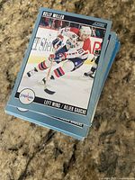 Stack of Score hockey trading cards with visible Kelly Miller Washington Capitals card