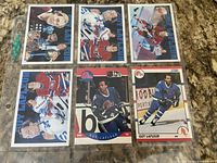 Front view of six Guy Lafleur hockey cards in plastic sleeve