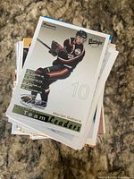 Stack of hockey cards, top card Marian Gaborik Team Leaders