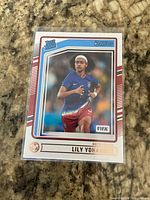 Front of Lily Yohannes Rated Rookie card in sleeve