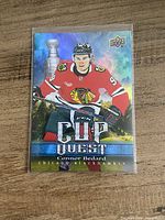 Front view of Connor Bedard Cup Quest Upper Deck trading card in sleeve