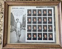 Overall view of framed sheet showing 20 stamps, photo panel, and frame