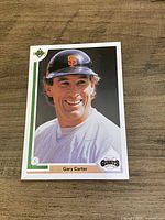 Front view of the baseball card displaying player image, name and team logo