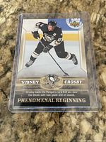 Front of Sidney Crosby Phenomenal Beginning card in protective case