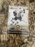 Front of Sidney Crosby Phenomenal Beginnings #2 Upper Deck card in sleeve