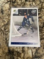 Front view of Tim Horton Ultimate hockey trading card in sleeve