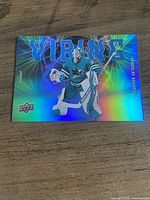 Front of holographic Upper Deck Vibing Yaroslav Askarov Star Rookie card