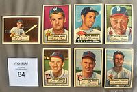 Fronts of seven 1952 Topps baseball cards laid out
