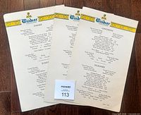 Front view of three Windsor luncheon menus showing crest and text