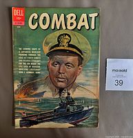 Front cover showing title, Dell logo, issue number 4, price 15¢, naval officer illustration
