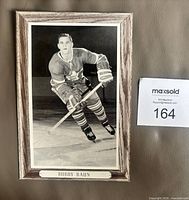Front view of Beehive Bobby Baun hockey photo showing image, nameplate, and condition