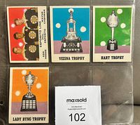 Fronts of all four 1970-71 OPC hockey cards in plastic sleeve