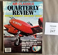 Front cover showing title, date, price, red P-38 Lightning, confirms publication details and condition