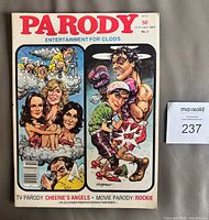 Front cover of Parody magazine showing Charlie's Angels and Rocky caricatures, issue information visible