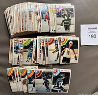 Front view of entire 98-card lot, multiple stacks showing player fronts