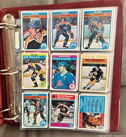 Fronts of nine highlighted cards featuring stars such as Messier, Kurri, Coffey, Mullen rookie, Stastny, Bourque, Semenko