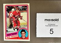 Front of Steve Yzerman rookie card showing image, borders, and corner wear