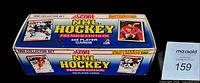 Closed factory box top showing product branding and 445 player cards note