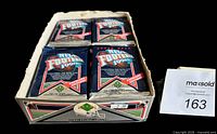 Open wax box showing sealed packs
