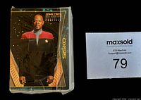Front of sealed stack showing card #1 featuring Captain Sisko