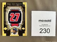 Front of 2003 Upper Deck Sweet Spot Patches card showing embroidered patch number 27 and player headshot