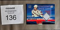 Front of Eric Lindros game-used jersey card with fabric swatch and serial number indicator