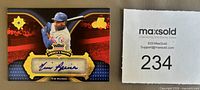 Front of 2007 Upper Deck Ultimate Collection America's Pastime autograph card showing Tim Raines image and blue ink signature