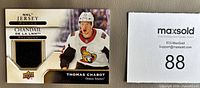 Front of Thomas Chabot Jersey Relics card showing jersey swatch