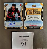 Front of Drake Batherson autographed card beside redemption card
