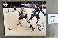 Front view of signed Allan Stanley Toronto Maple Leafs 8x10 color photo with MaxSold lot card