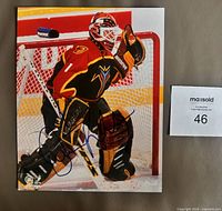 Full view of autographed 8x10 photo with signature visible