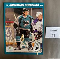 Front of signed fan club page showing photo and signature