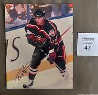 Full view of autographed 8x10 photo