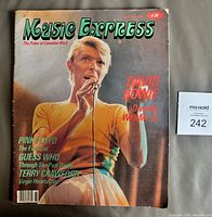 Front cover showing David Bowie and magazine logo