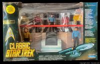 Front view of sealed Classic Star Trek collector set showing figures and bridge diorama inside window box