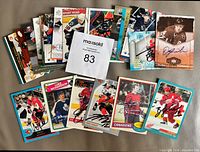All 25 autographed hockey cards laid out