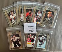 All nine sleeved postcards laid out