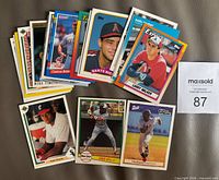 Stack of rookie cards with several featured cards fanned to show fronts