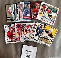 All 20 rookie cards fanned out showing fronts