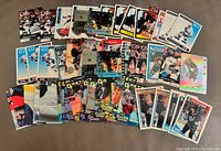 All 54 Gretzky cards spread out showing variety of sets and years