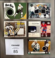 front view of all five game-used memorabilia cards
