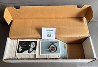 Open cardboard long box holding approximately 500 hockey trading cards