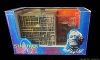 Front of sealed Star Trek Borg Bank box showing product through window
