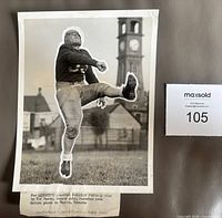 Front of vintage wire photo showing Bobby Porter kicking football
