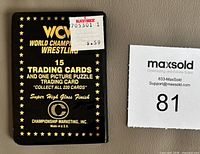 Front of sealed 1991 WCW trading card wax pack showing branding, card count, price sticker