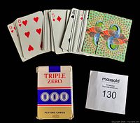 Deck spread showing card faces and backs, box visible