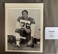 Front of 8x10 black and white promo photo featuring Jay Roberts in uniform
