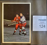 Front view of the Toronto Star "Hockey Stars in Action" Doug Harvey action photograph with measurement scale card