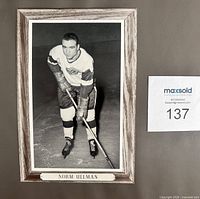 Front of Beehive Group 3 hockey photo showing Norm Ullman in full uniform with simulated wood border and name caption
