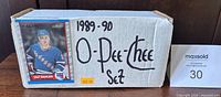 Cardboard set box labeled 1989-90 O-Pee-Chee with Ulf Dahlen card on end panel